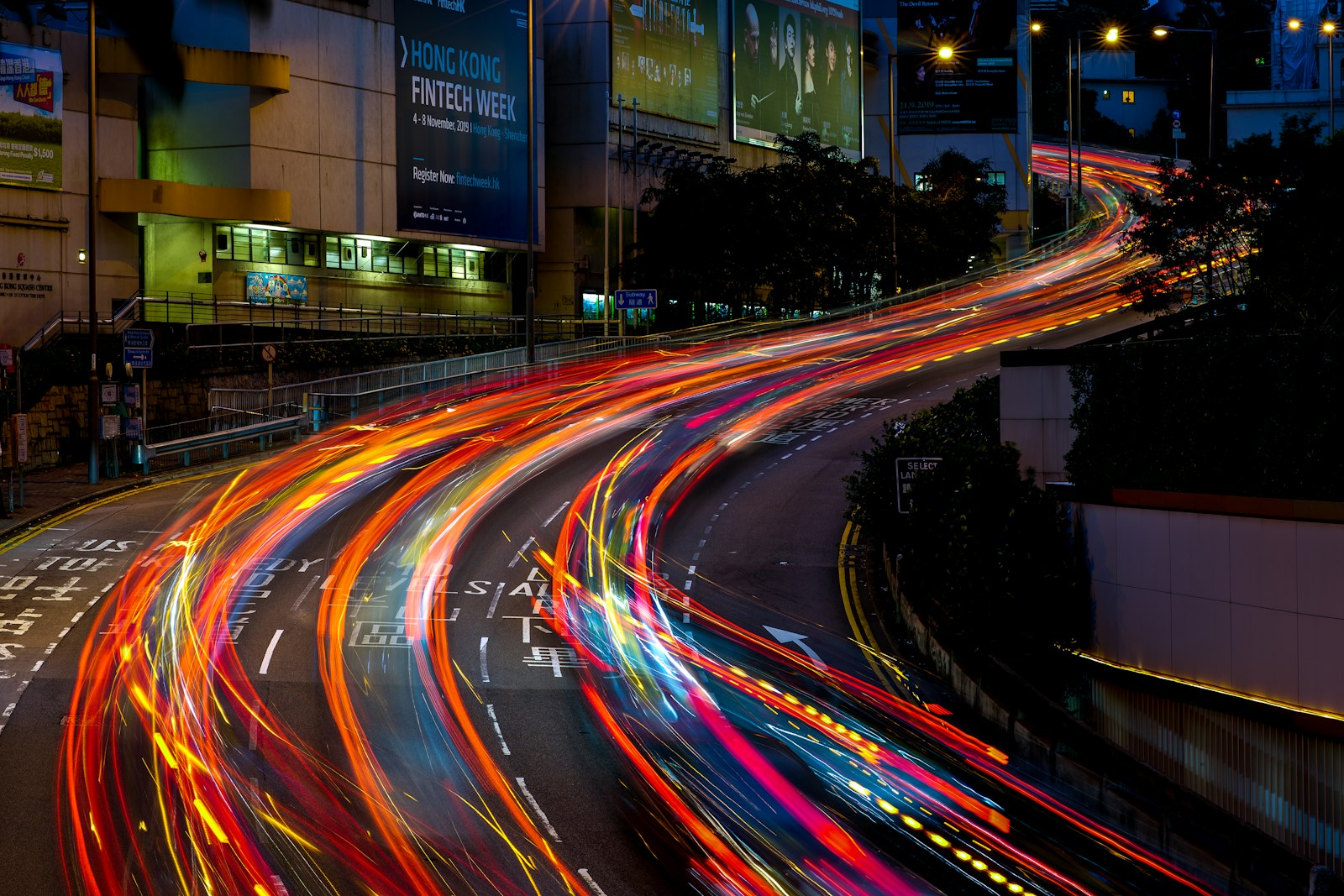 time lapse photography of busy street